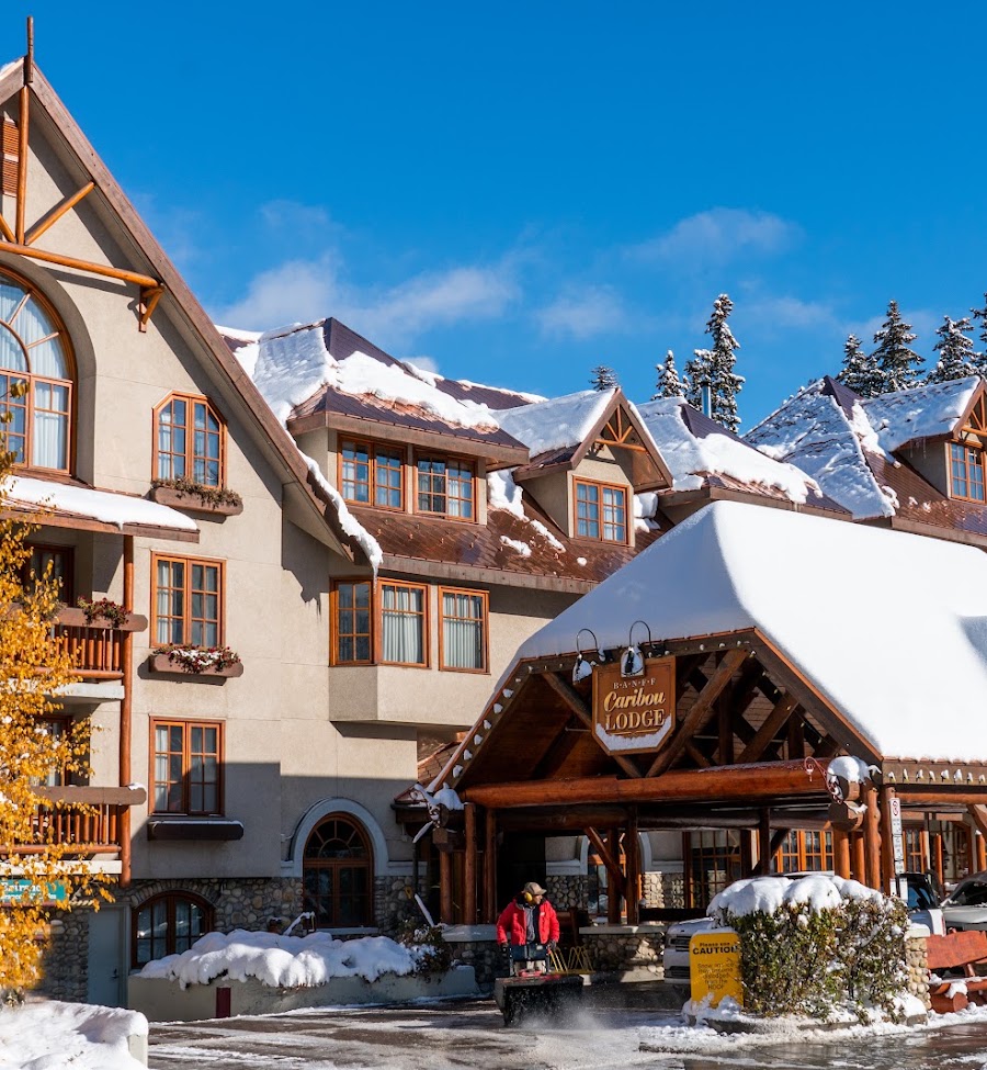 Banff Caribou Lodge & Spa in winter, snow-covered mountain lodge